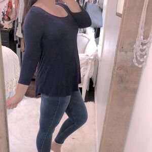 Sweet Tea’s size medium navy blue flowy top
